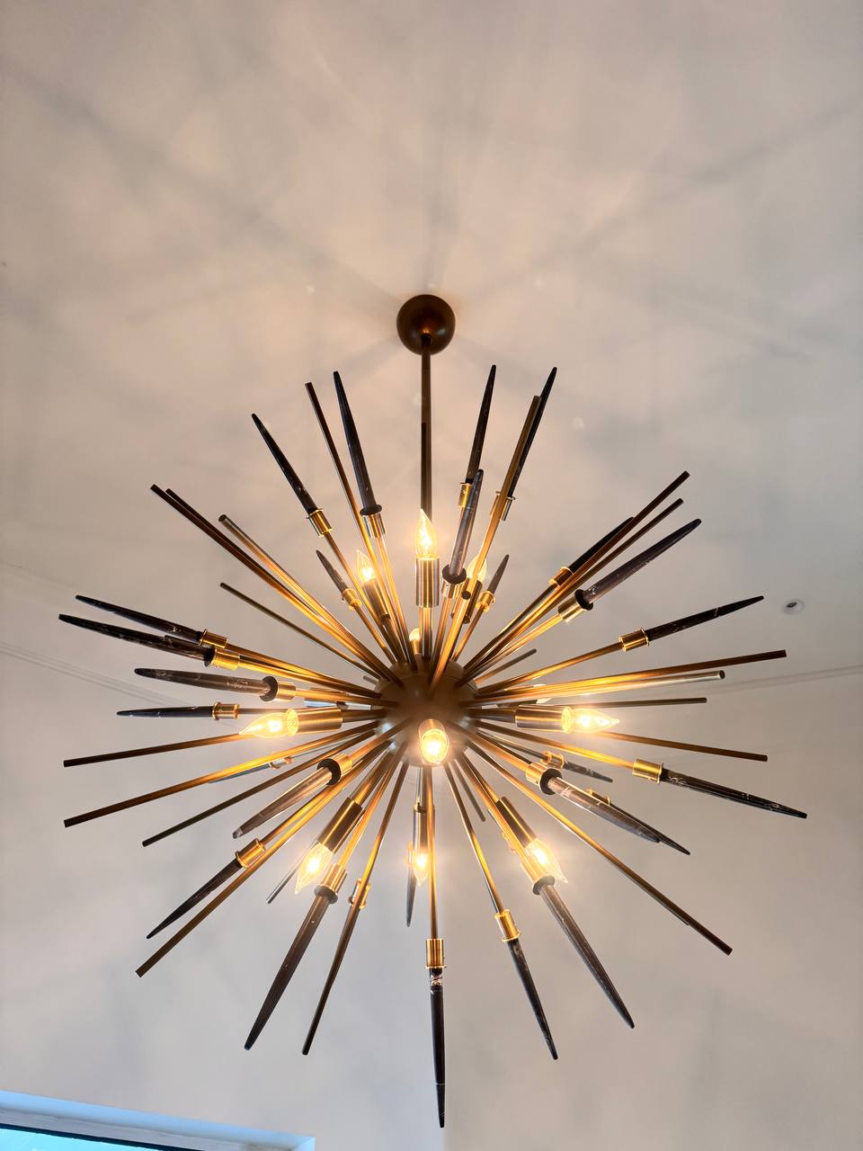 Sputnik-style chandelier installation