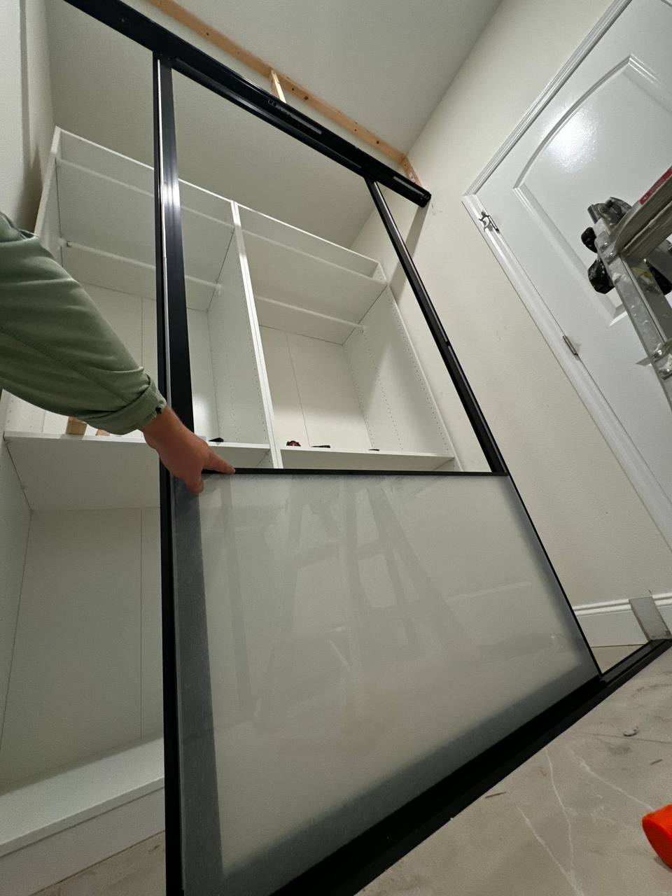 Frameless glass shower door installation